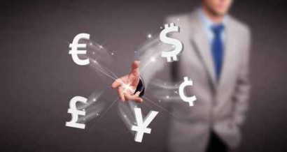 Attractive man throwing currency icons